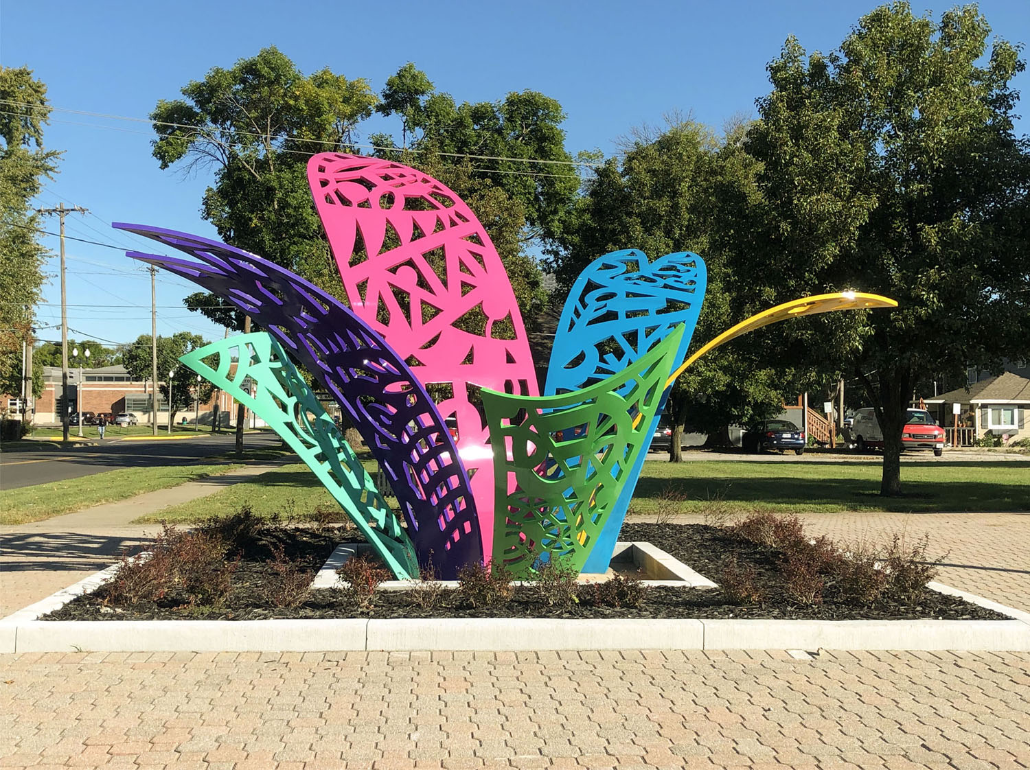 Large colorful sculpture titled Bloom by Sijia Chen