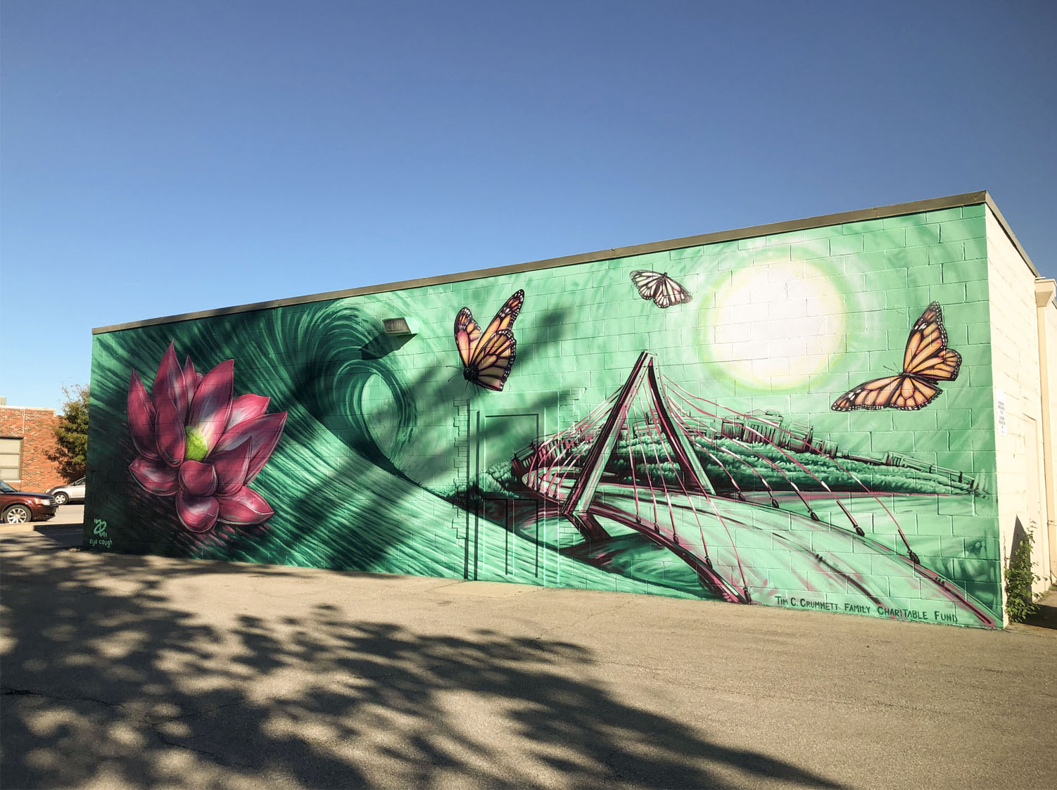 The Wave by artist Alex Eickhoff, mural on side of building in North Kansas City