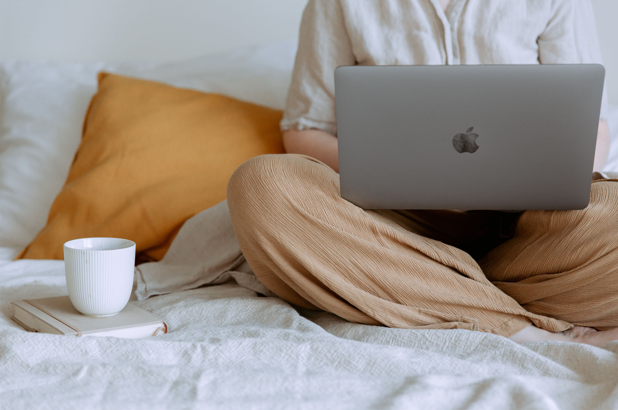 woman with coffee using a computer