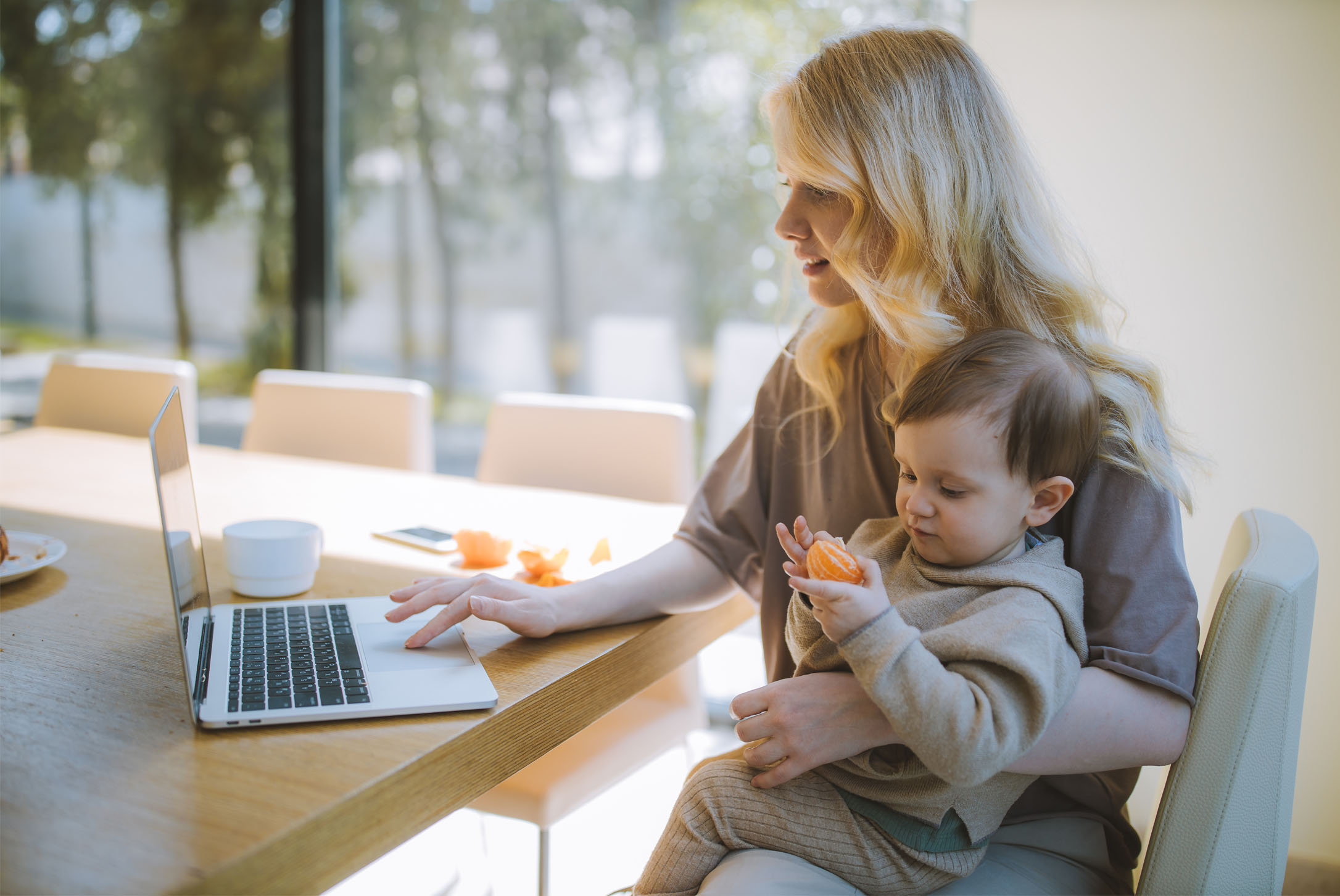 Mother and son using a computer